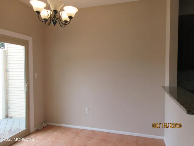 en empty room with windows