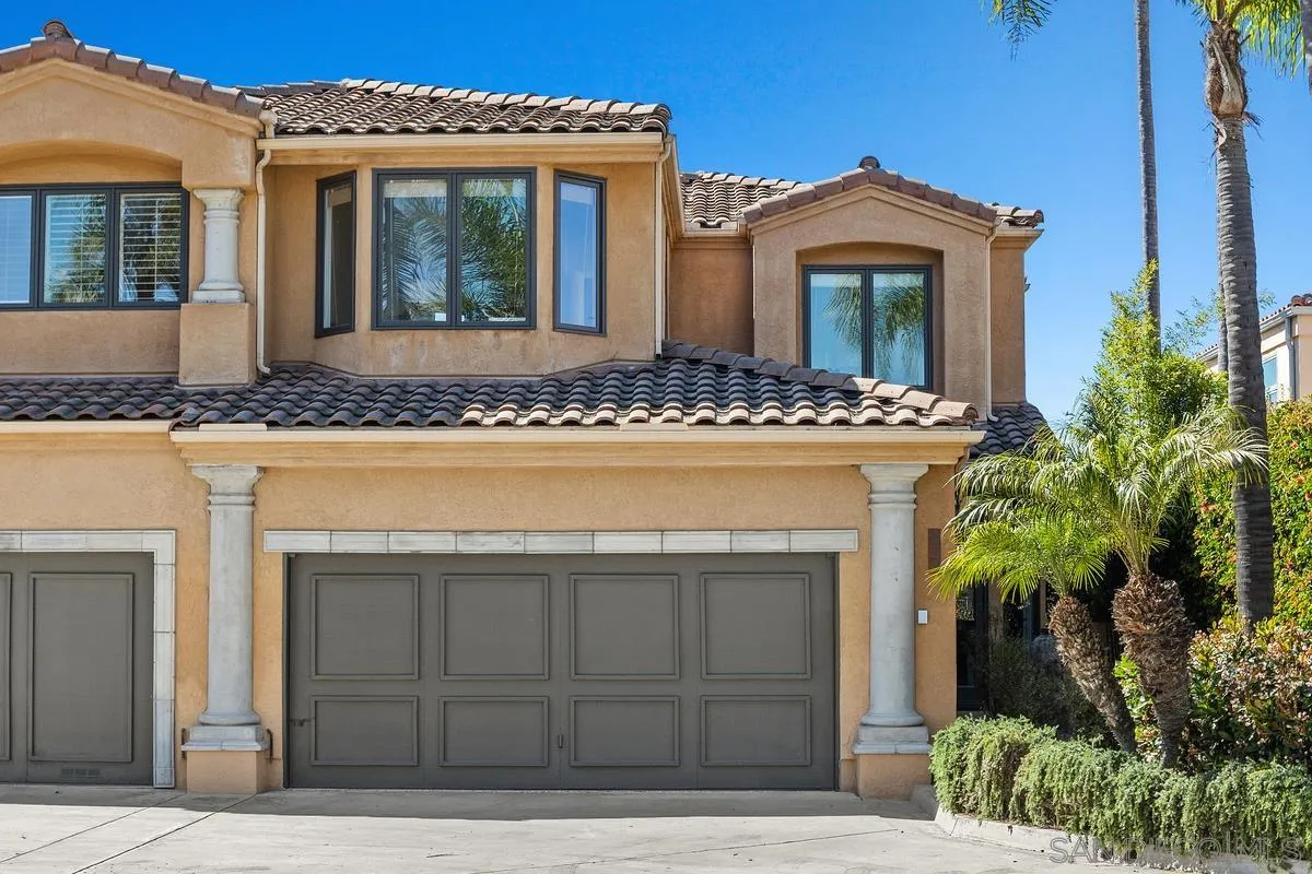849 North Rios Avenue Solana Beach, CA 92075 - Photo 5 of 40 a front view of a house with a yard and garage