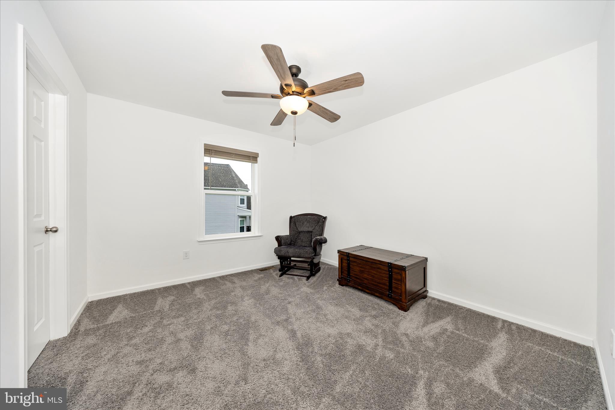309 Eliza Road New Freedom, PA 17349 - Photo 29 of 57 a living room with furniture and a window