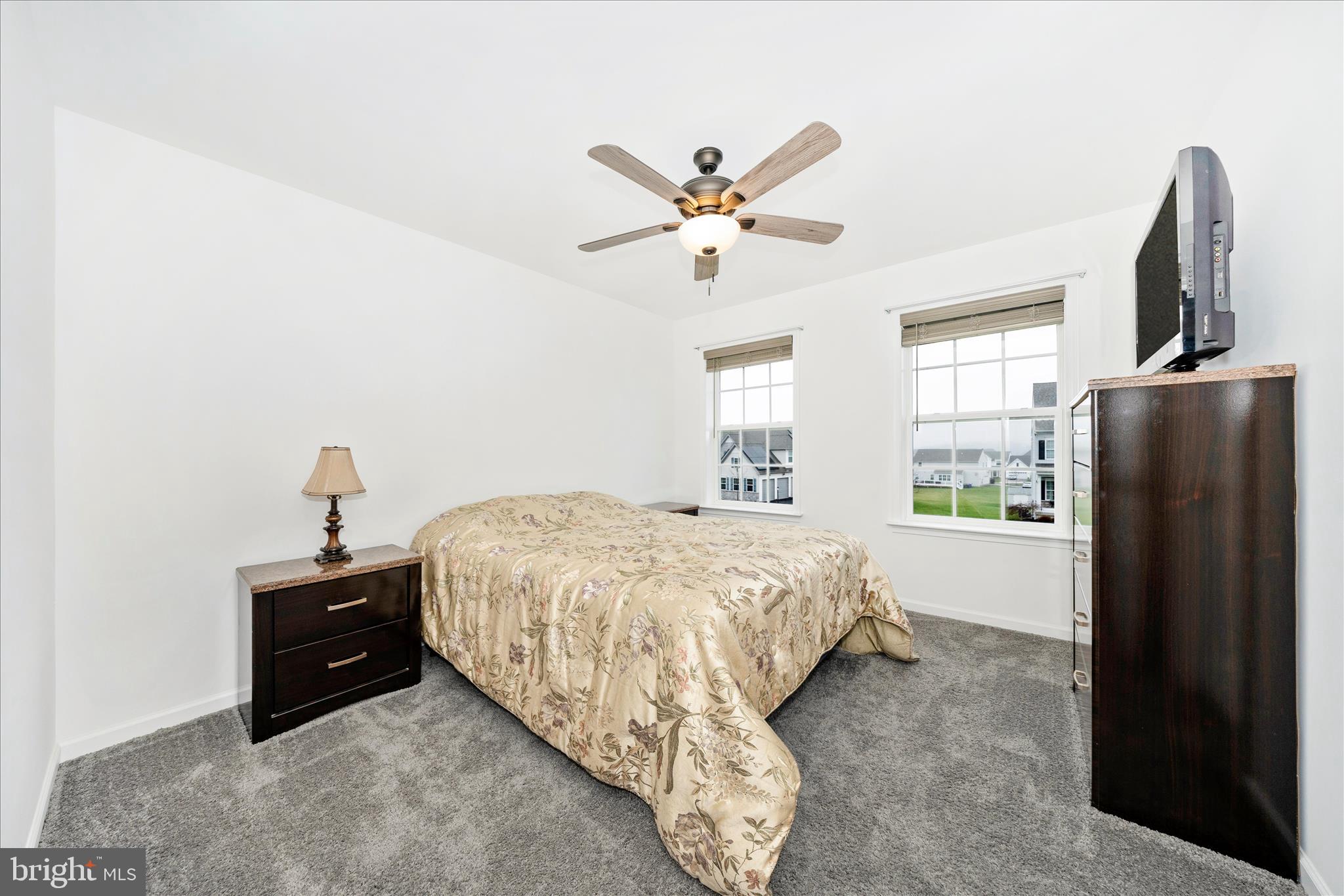 309 Eliza Road New Freedom, PA 17349 - Photo 31 of 57 a bedroom with a bed and a window