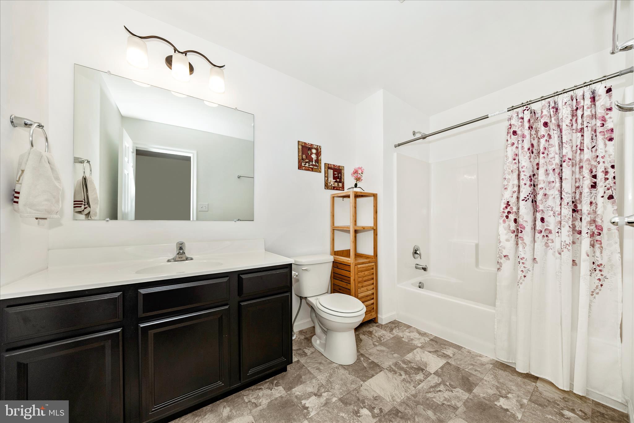 309 Eliza Road New Freedom, PA 17349 - Photo 33 of 57 a bathroom with a double vanity sink toilet and shower