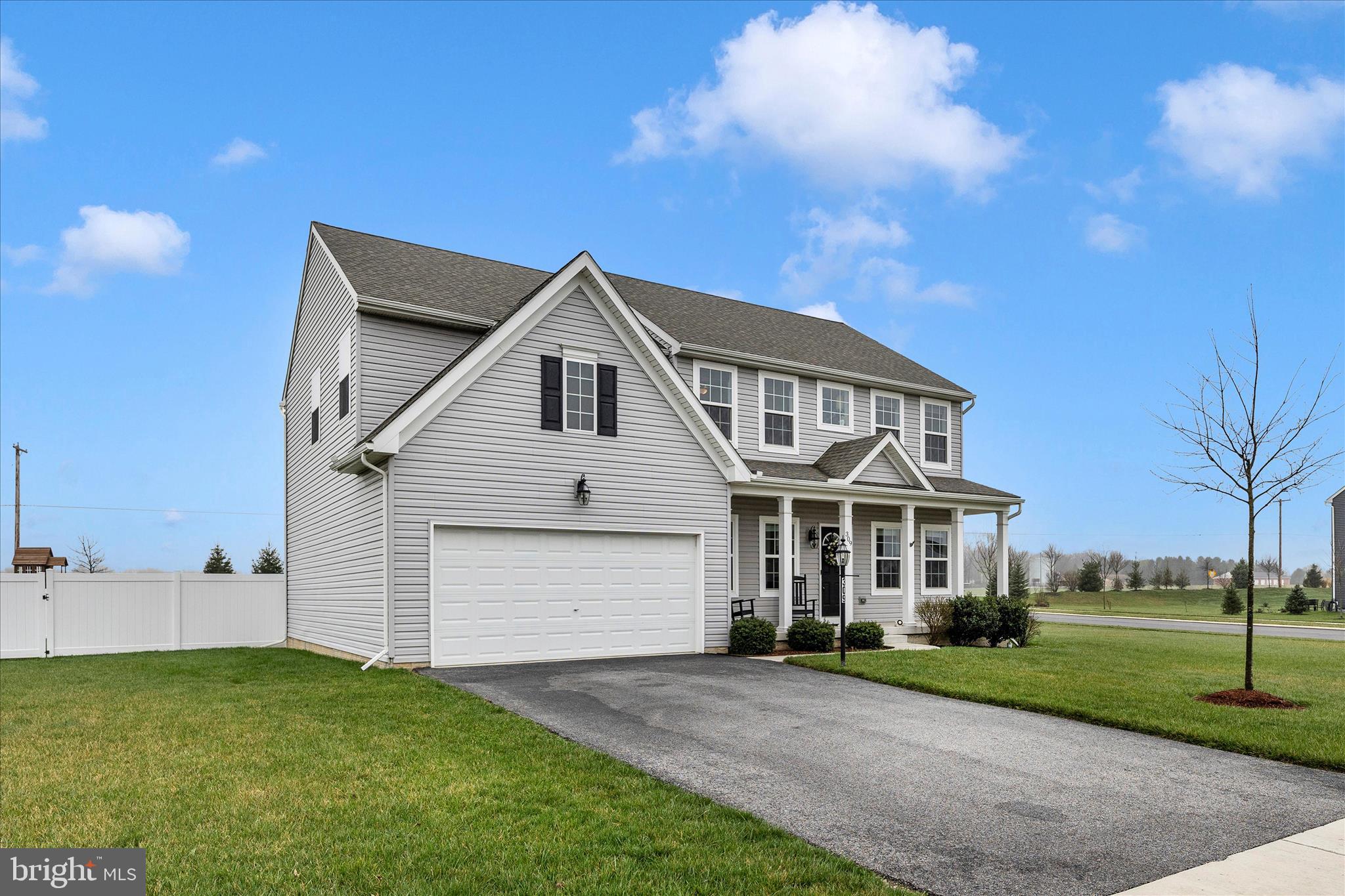 309 Eliza Road New Freedom, PA 17349 - Photo 40 of 57 a front view of a house with a yard