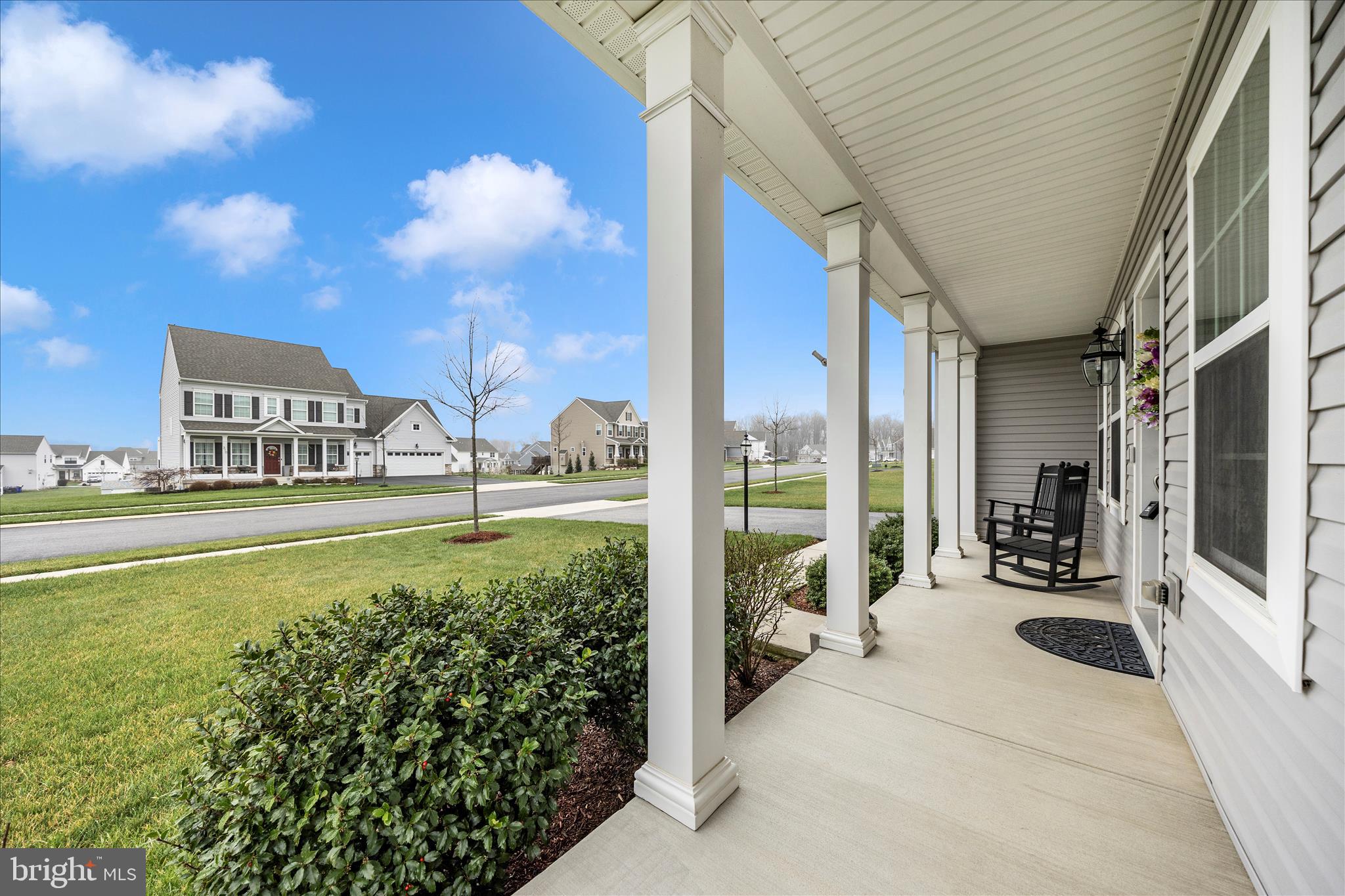 309 Eliza Road New Freedom, PA 17349 - Photo 43 of 57 a view of a patio with couches table and chairs and potted plants