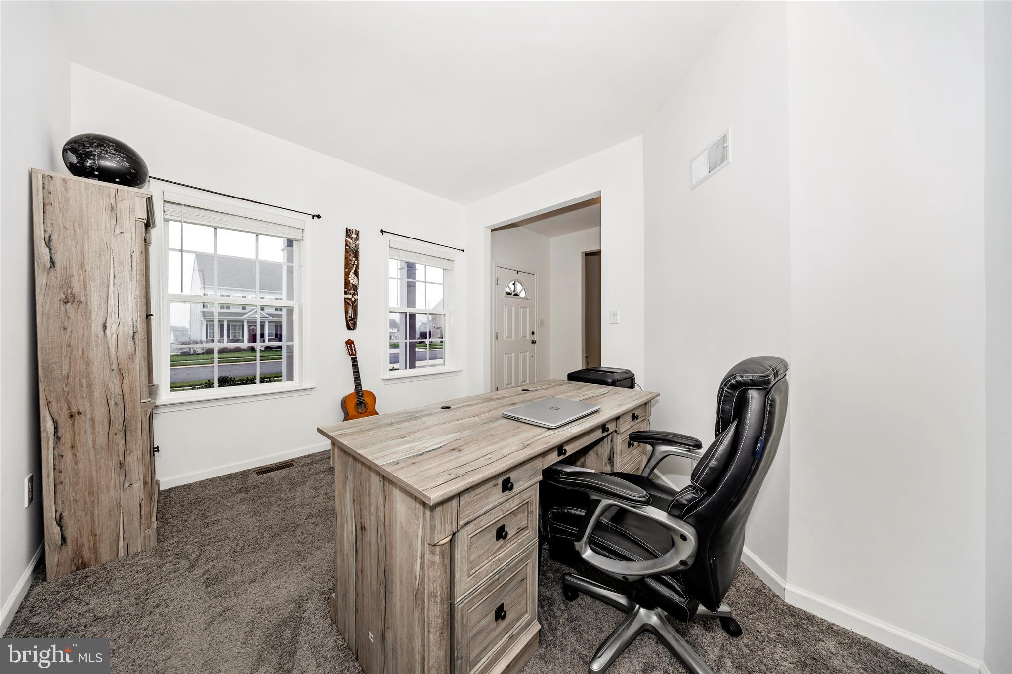 309 Eliza Road New Freedom, PA 17349 - Photo 5 of 57 a view of a workspace with furniture and a window