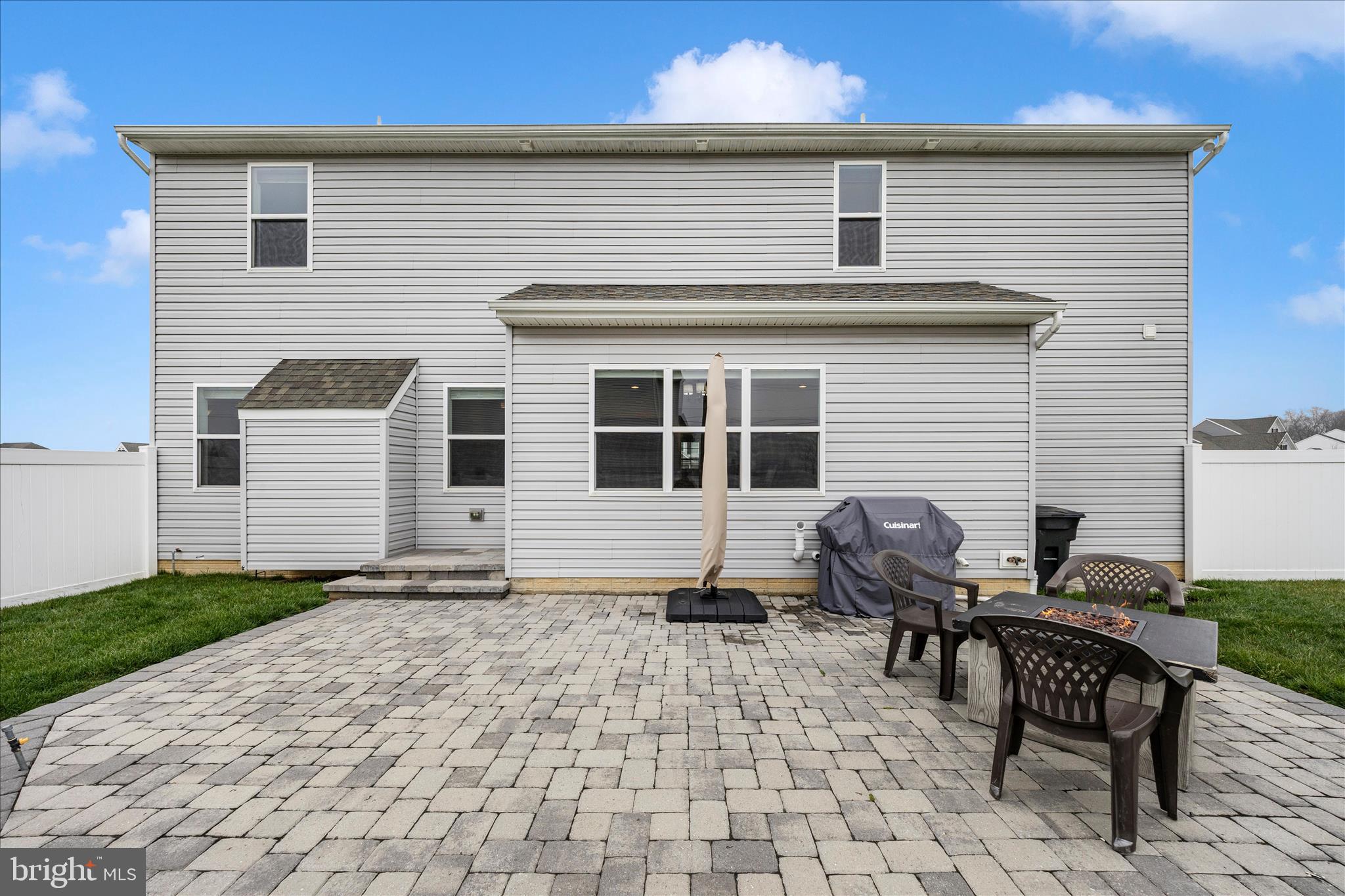 309 Eliza Road New Freedom, PA 17349 - Photo 51 of 57 a backyard of a house with table and chairs
