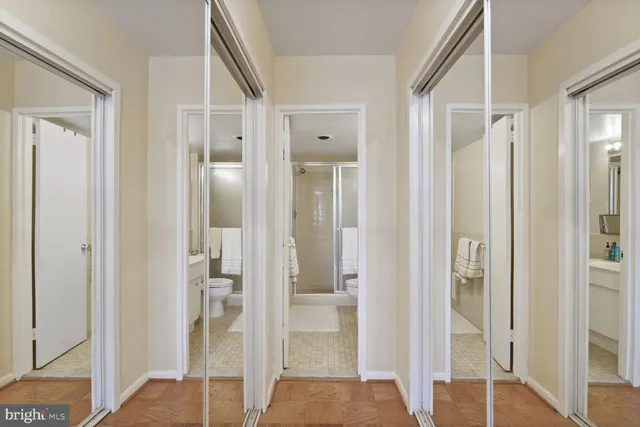 a view of a bathroom from a hallway