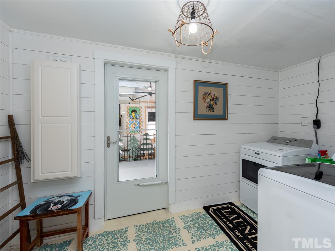 612 North Boundary Street Raleigh, NC 27604 - Photo 19 of 28 a room with cabinets and wooden floor