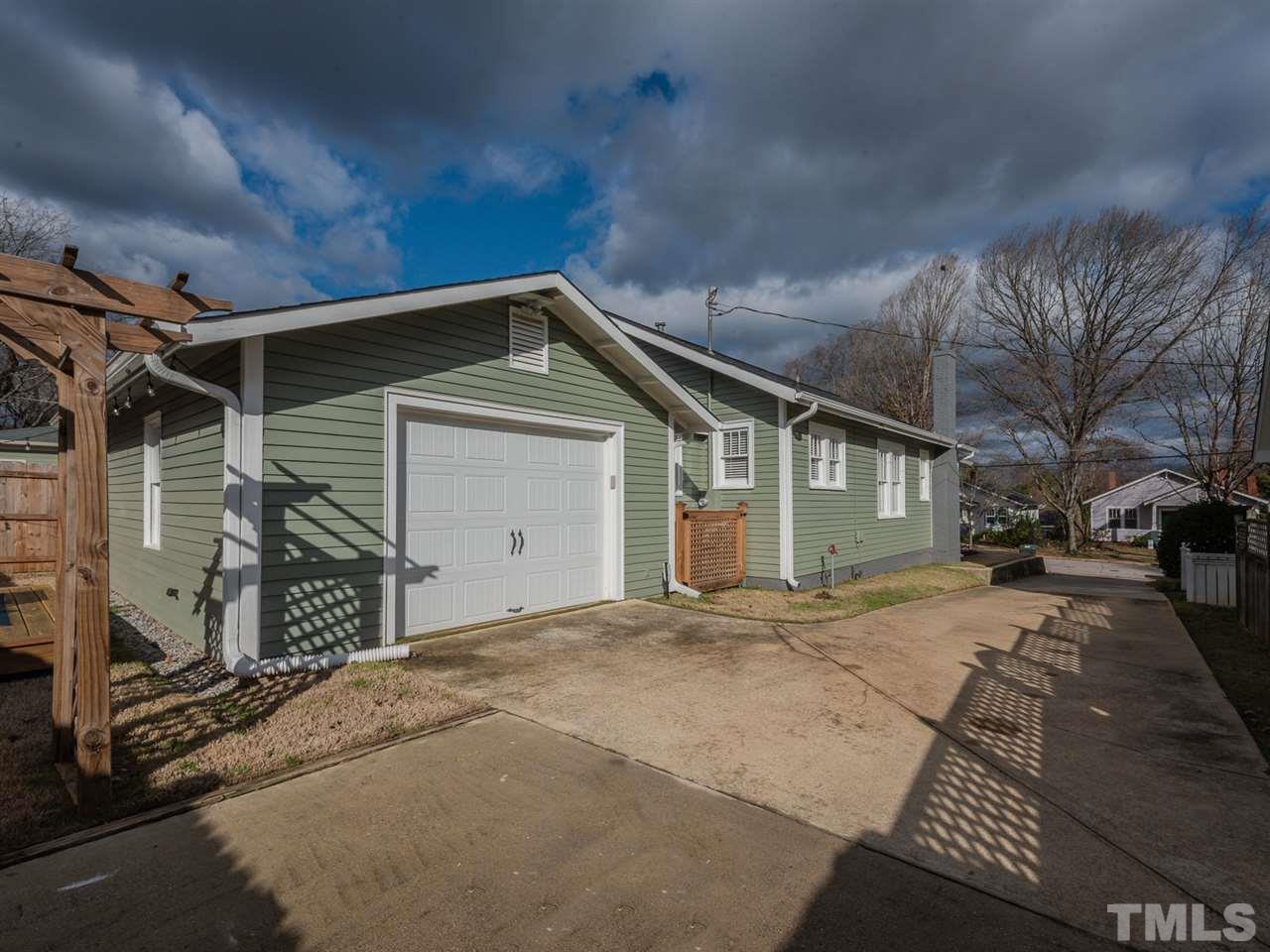 612 North Boundary Street Raleigh, NC 27604 - Photo 26 of 28 a front view of a house with a yard