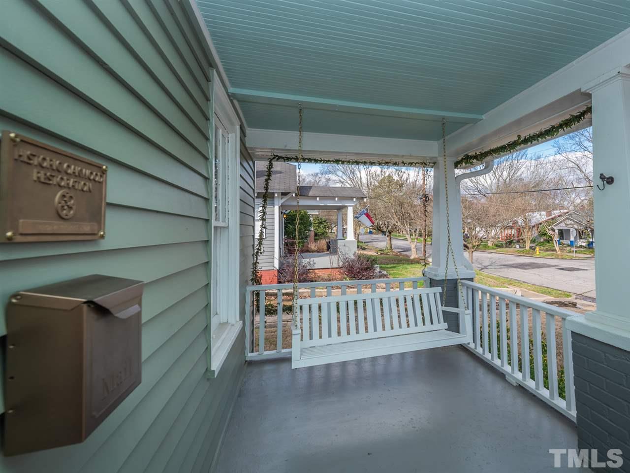 612 North Boundary Street Raleigh, NC 27604 - Photo 4 of 28 a view of a porch with wooden floor