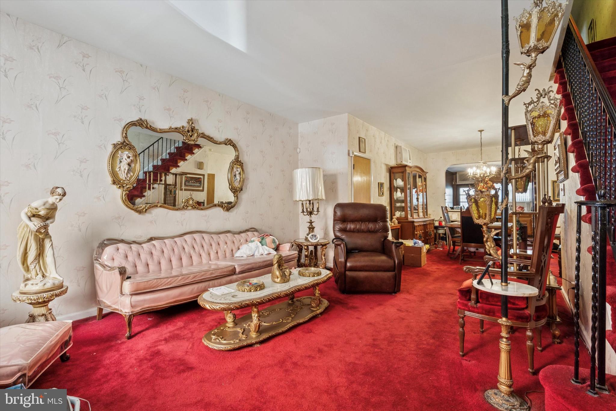 1637 West Ritner Street Philadelphia, PA 19145 - Photo 2 of 15 a living room with furniture gym equipment and a couch