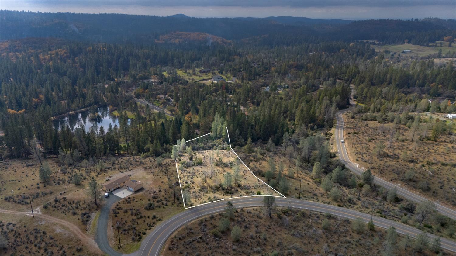 12137 Newtown Road Nevada City, CA 95959 - Photo 26 of 34 a view of a forest with mountain