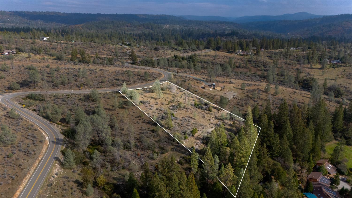12137 Newtown Road Nevada City, CA 95959 - Photo 27 of 34 a view of a forest with mountains and a mountain view