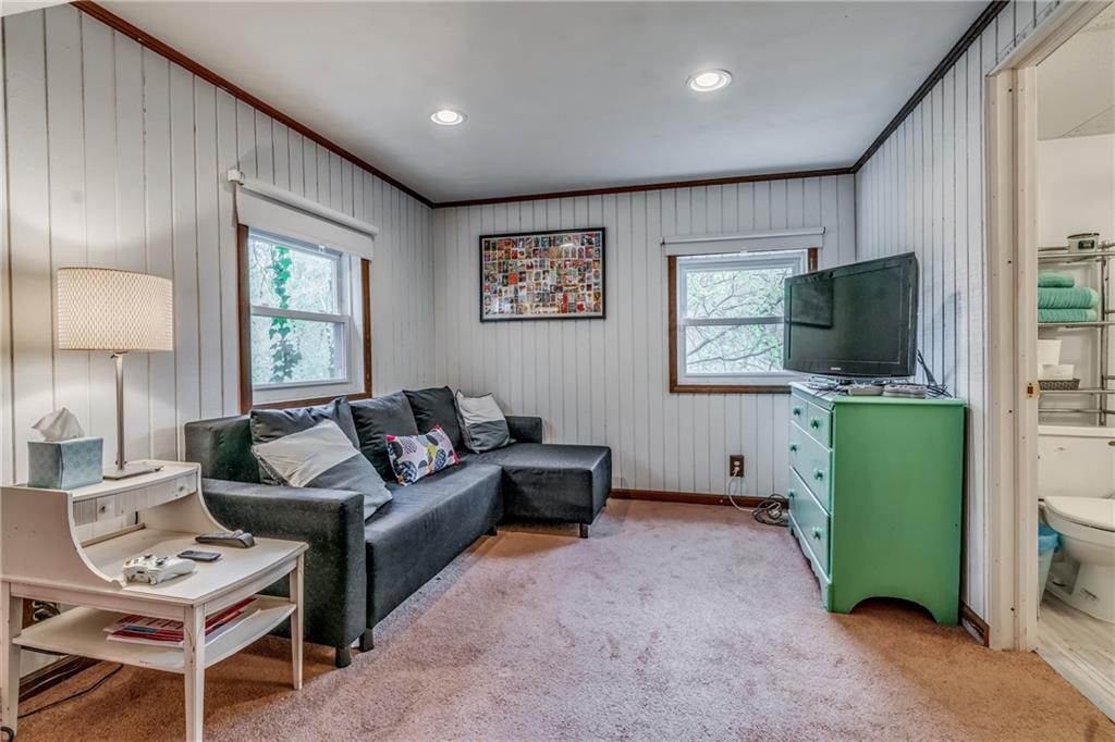 6 Virginia Terrace Pittsburgh, PA 15229 - Photo 16 of 23 a living room with furniture a flat screen tv and a window