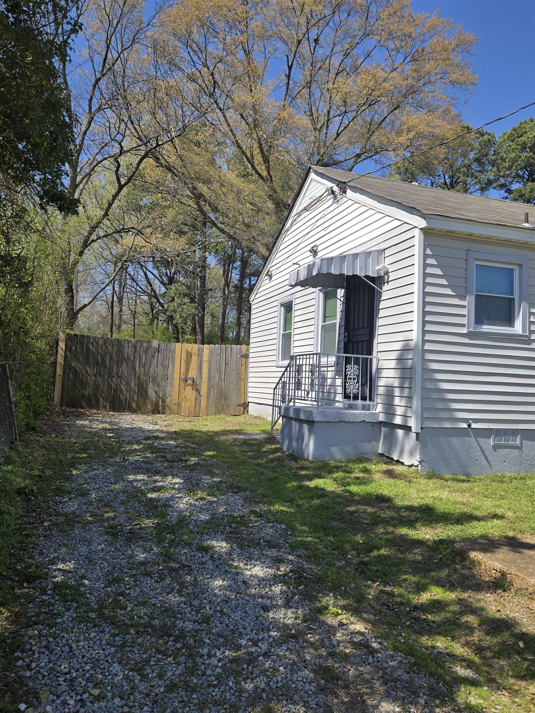 4753 Berta Road Memphis, TN 38109 - Photo 4 of 15 a view of a house with backyard and sitting area