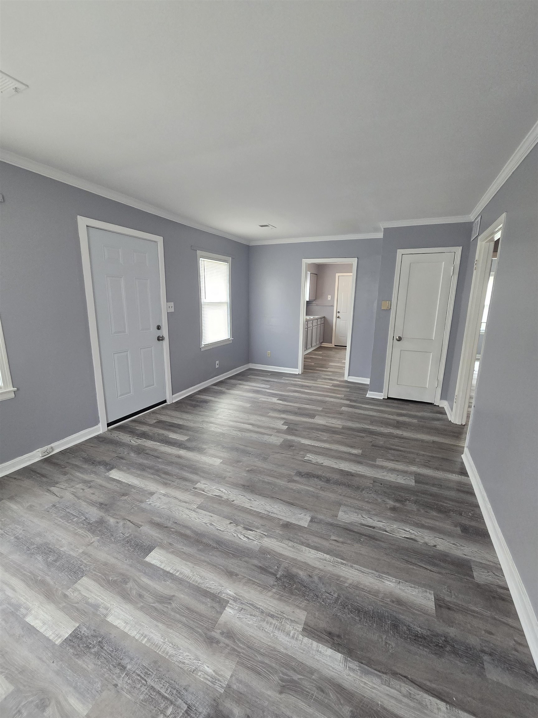 4753 Berta Road Memphis, TN 38109 - Photo 6 of 15 a view of empty room with wooden floor