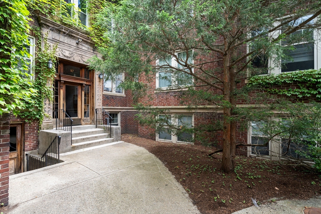 97 Chester Street, Unit 8 Boston, MA 02134 - Photo 1 of 19 front view of house with a yard