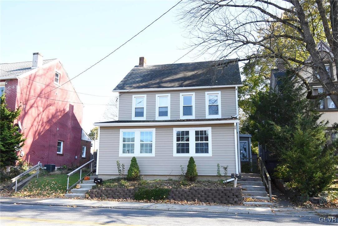 121 Main Street Hellertown, PA 18055 - Photo 29 of 29 a front view of a house with a yard and tree s
