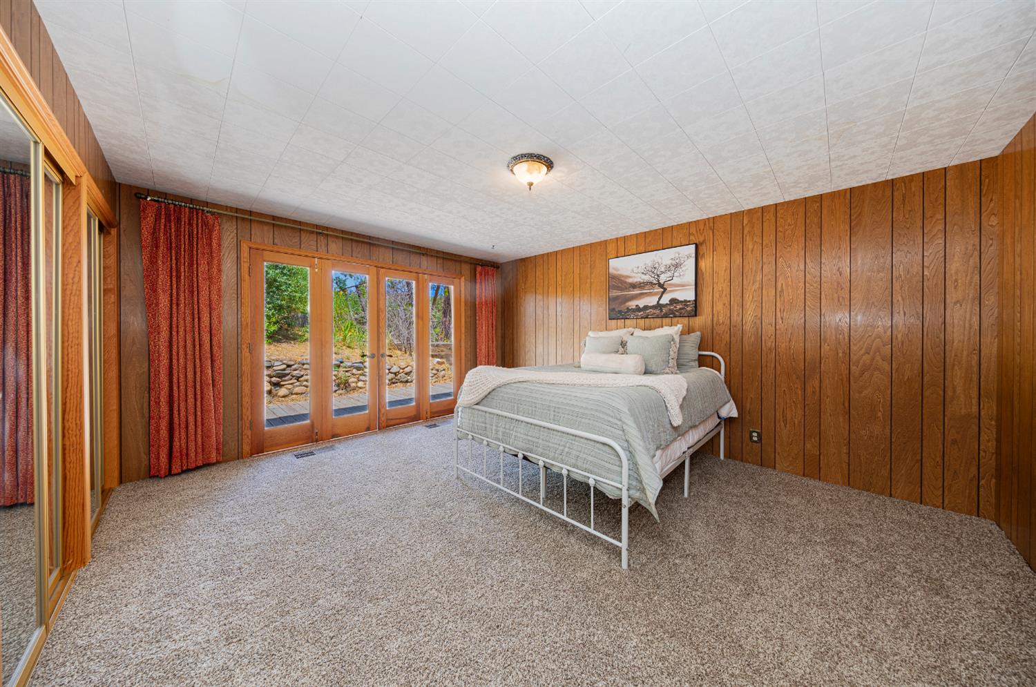 4482 Hirsch Road Mariposa, CA 95338 - Photo 45 of 83 Large bedroom #3 with beautiful doors to side deck