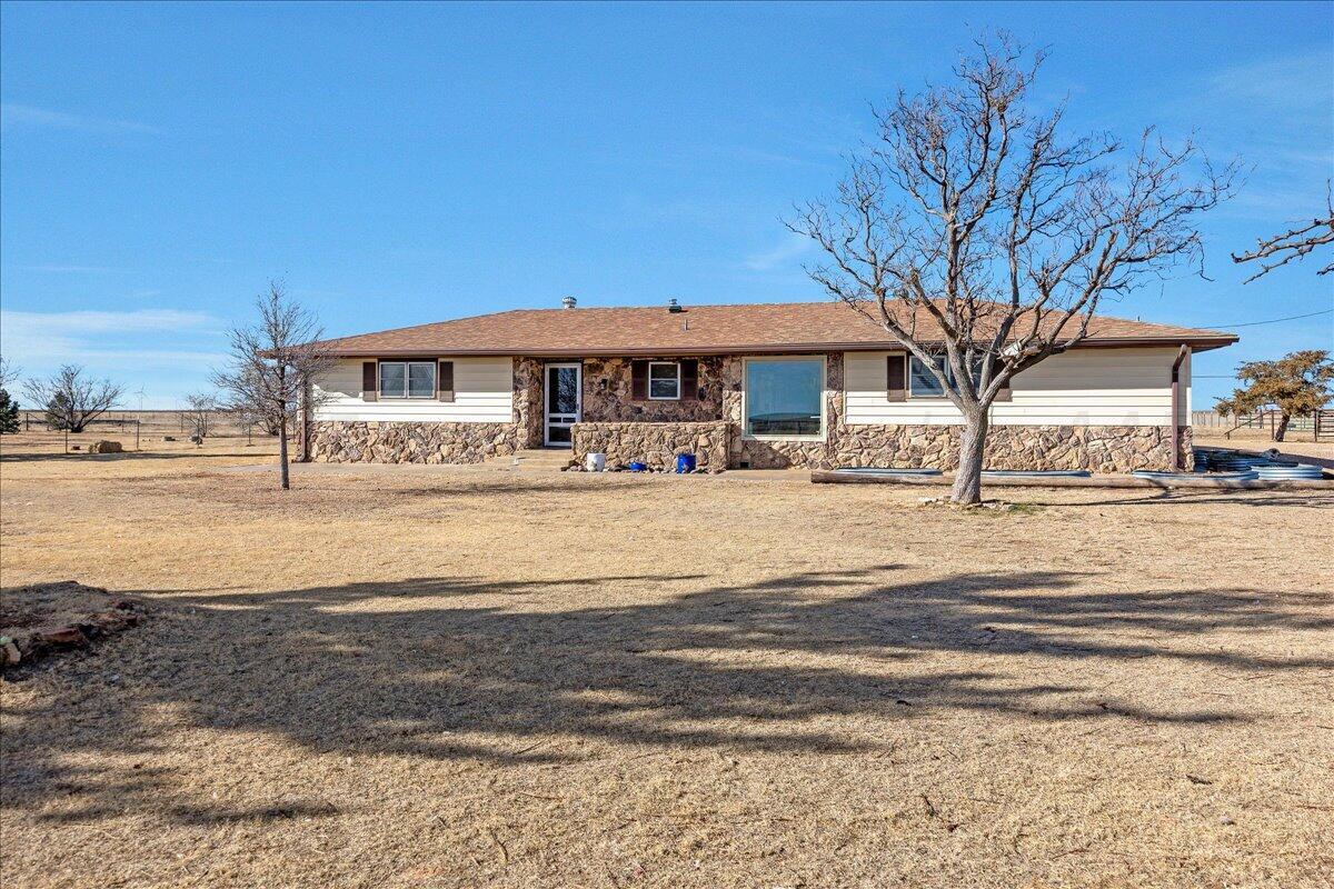 39000 Farm To Market 1705 Happy, TX 79042 - Photo 2 of 45 a view of a house with a snow on the road