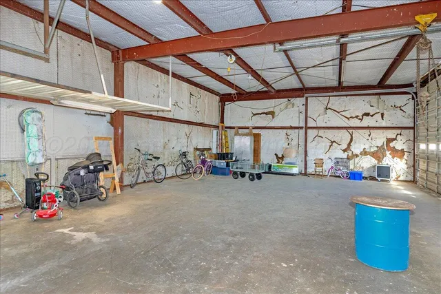 a view of a garage with storage