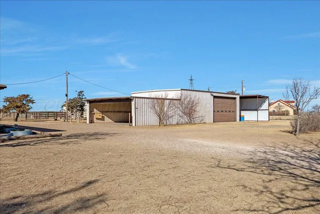 a big house with a yard and garage