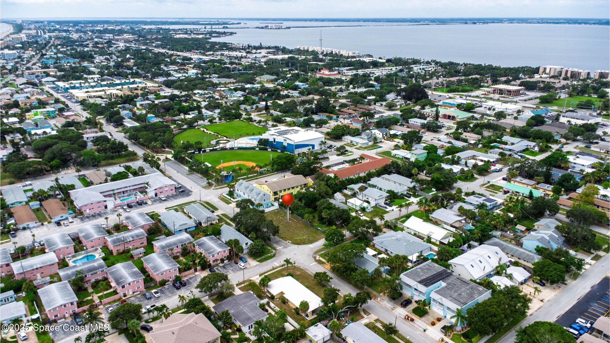 337 Madison Avenue Cape Canaveral, FL 32920 - Photo 7 of 9 an aerial view of residential houses with city view