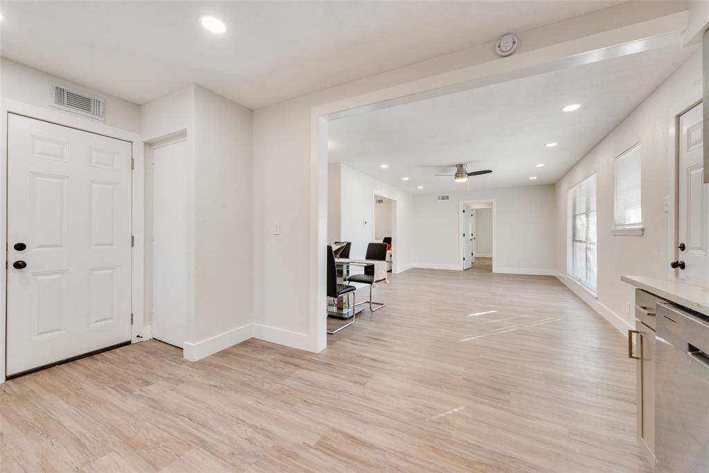 5311 Rocky Ridge Road Dallas, TX 75241 - Photo 16 of 24 a view of a kitchen with a sink and a stove top oven