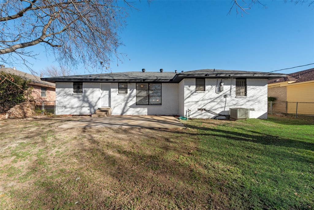 5311 Rocky Ridge Road Dallas, TX 75241 - Photo 24 of 24 a front view of a house with a yard