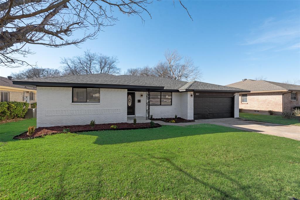 5311 Rocky Ridge Road Dallas, TX 75241 - Photo 3 of 24 a front view of a house with a garden and yard
