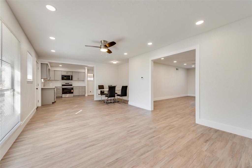 5311 Rocky Ridge Road Dallas, TX 75241 - Photo 9 of 24 a view of kitchen with furniture and wooden floor