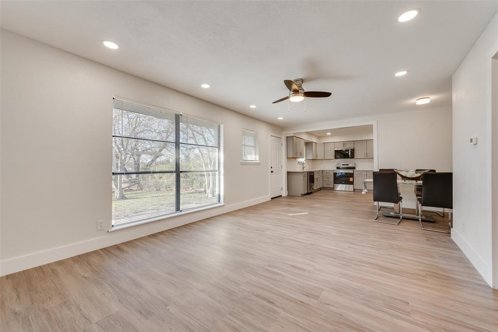 5311 Rocky Ridge Road Dallas, TX 75241 - Photo 10 of 24 a view of kitchen with furniture and wooden floor
