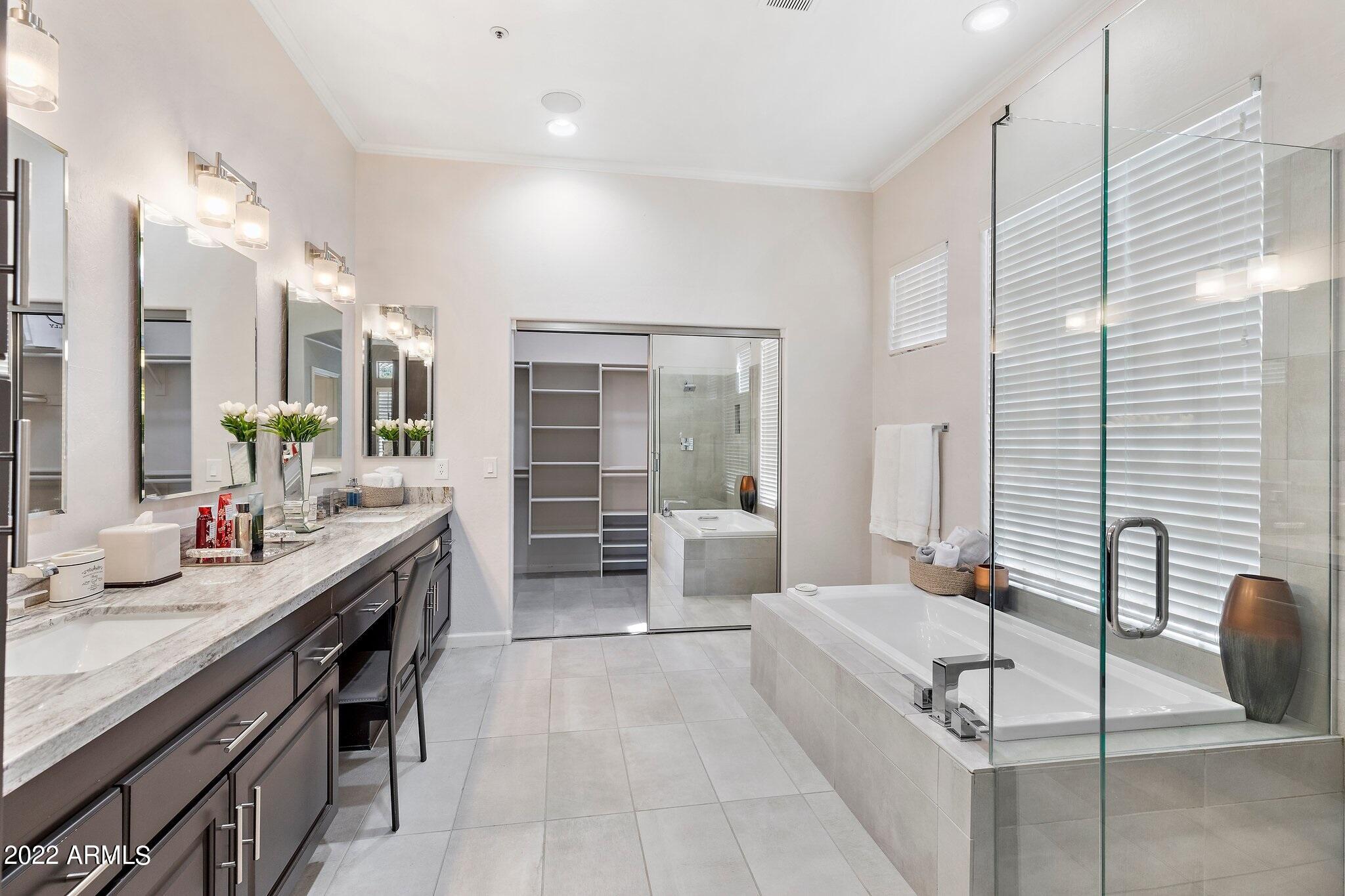 8184 East Beardsley Road Scottsdale, AZ 85255 - Photo 17 of 39 a large bathroom with a large tub and sink