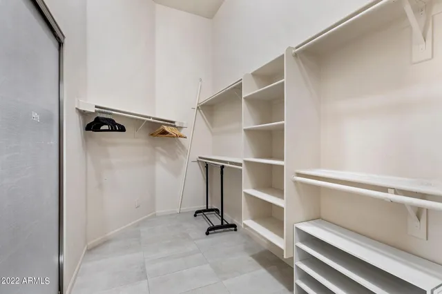 a view of an empty walk in closet