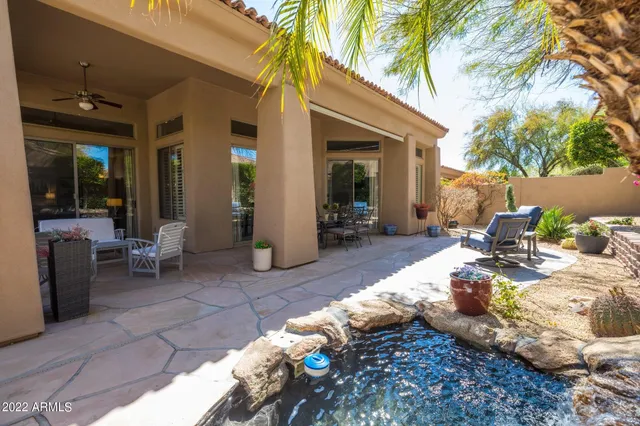 a view of a backyard of a house
