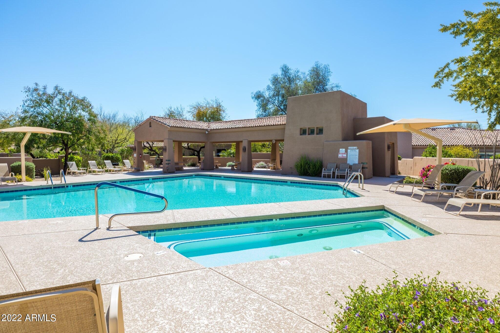 8184 East Beardsley Road Scottsdale, AZ 85255 - Photo 36 of 39 view of a house with a yard and sitting area