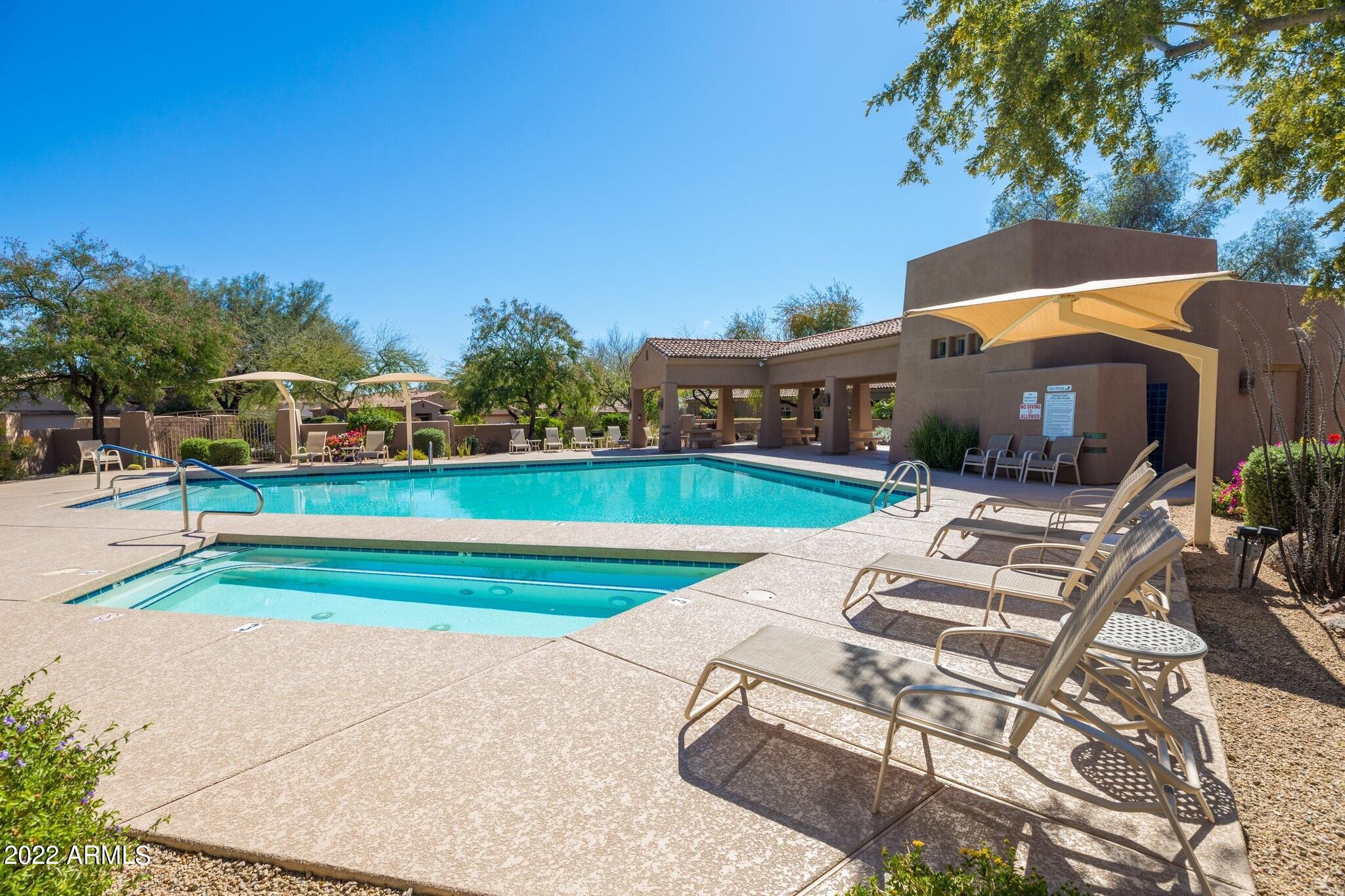 8184 East Beardsley Road Scottsdale, AZ 85255 - Photo 37 of 39 a view of a house with a yard and sitting area