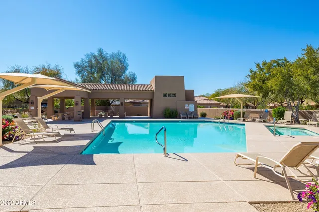 a front view of a house with a garage