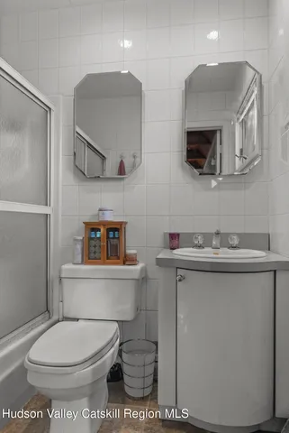 a backyard of a house with wooden floor