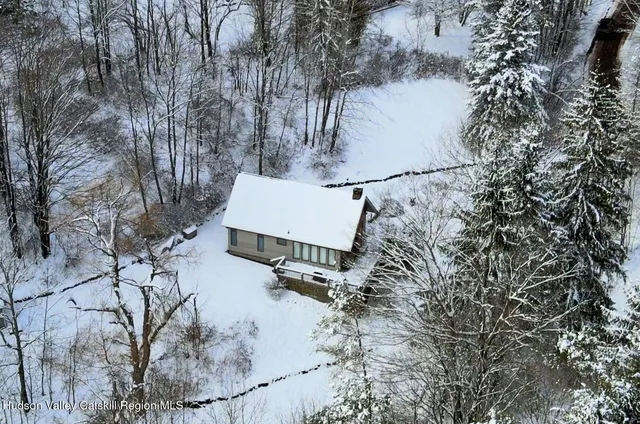 a view of a backyard of the house