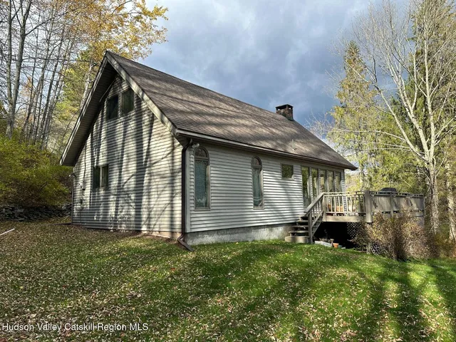 a front view of house with yard