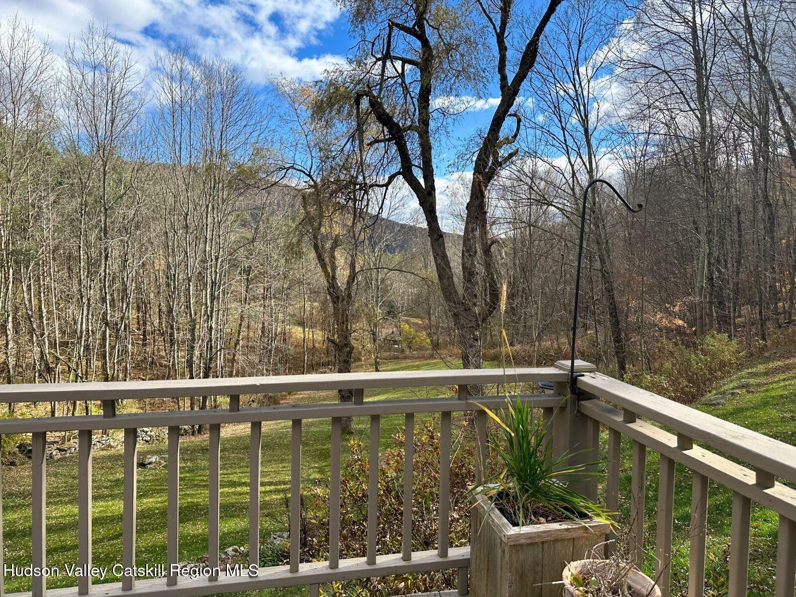 107 Ox Road Roxbury, NY 12421 - Photo 4 of 30 a balcony with trees
