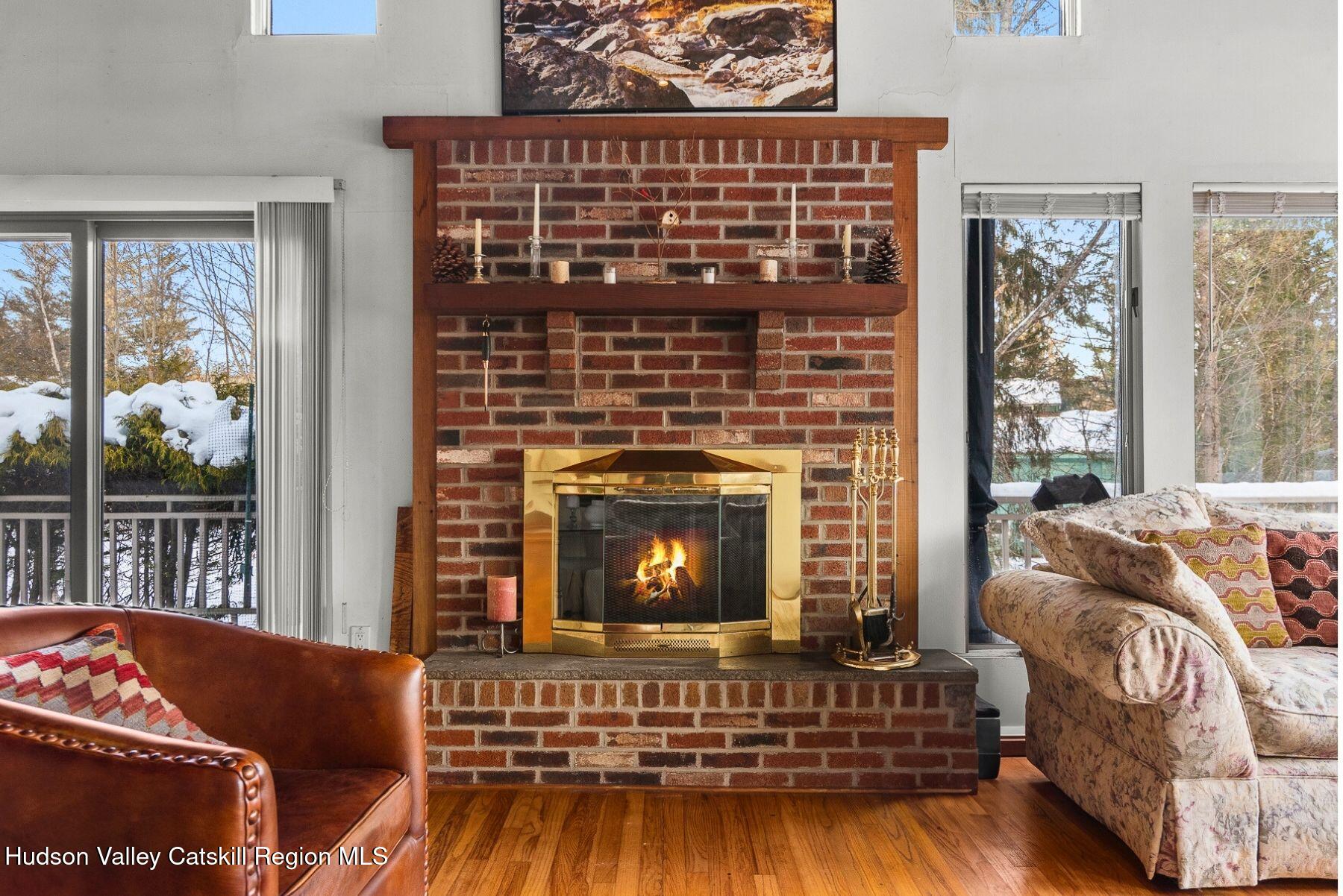 107 Ox Road Roxbury, NY 12421 - Photo 6 of 30 a living room with furniture and a fireplace