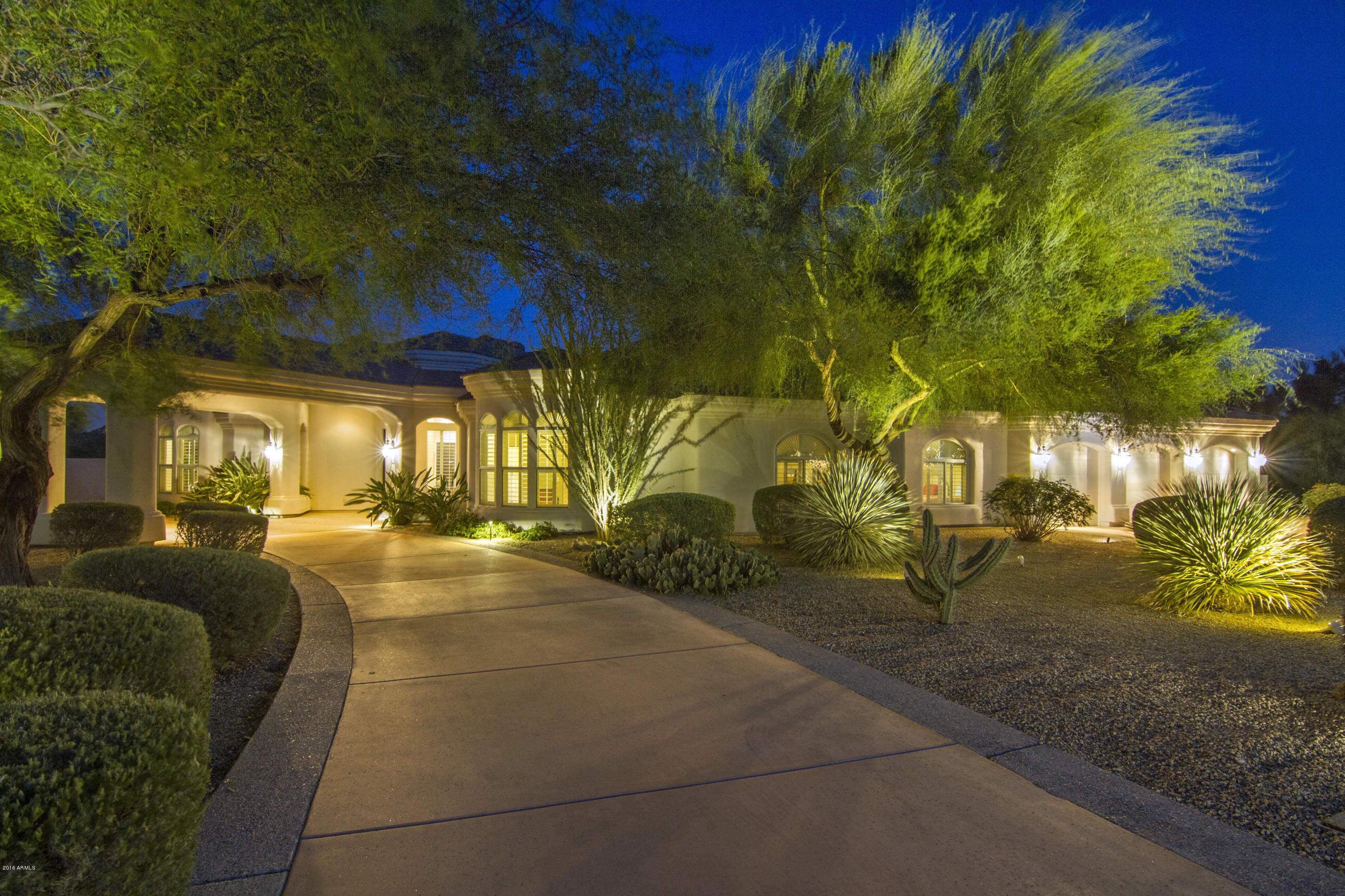4805 East Pebble Ridge Road Paradise Valley, AZ 85253 - Photo 2 of 37 a view of swimming pool with outdoor seating