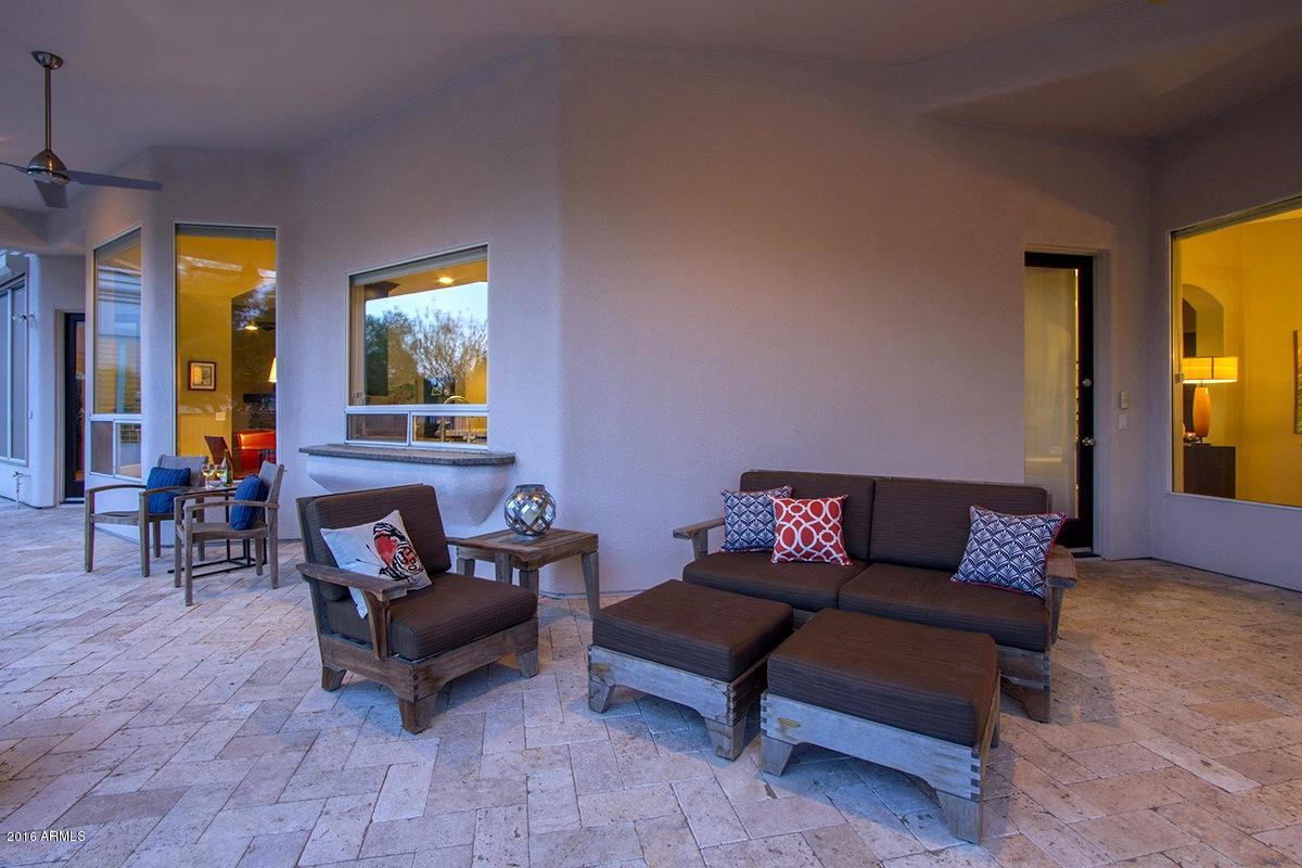 4805 East Pebble Ridge Road Paradise Valley, AZ 85253 - Photo 33 of 37 a living room with furniture and a potted plant