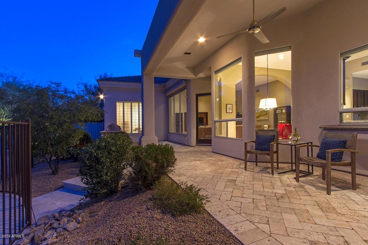 4805 East Pebble Ridge Road Paradise Valley, AZ 85253 - Photo 35 of 37 a lobby with furniture and flowers