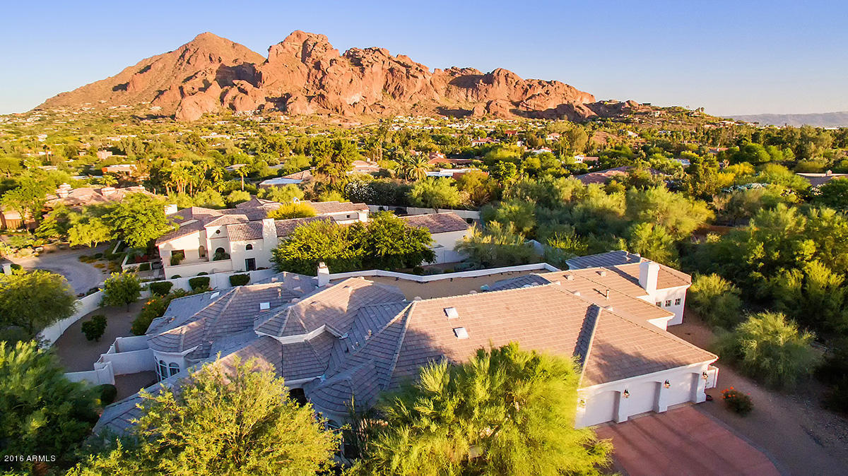 4805 East Pebble Ridge Road Paradise Valley, AZ 85253 - Photo 4 of 37 an aerial view of residential houses with outdoor space