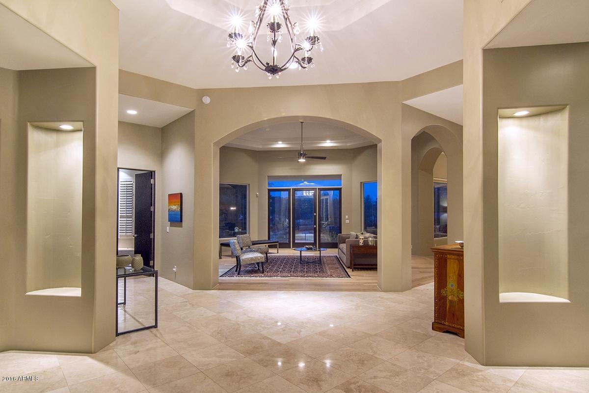 4805 East Pebble Ridge Road Paradise Valley, AZ 85253 - Photo 5 of 37 a view of a room with gym equipment