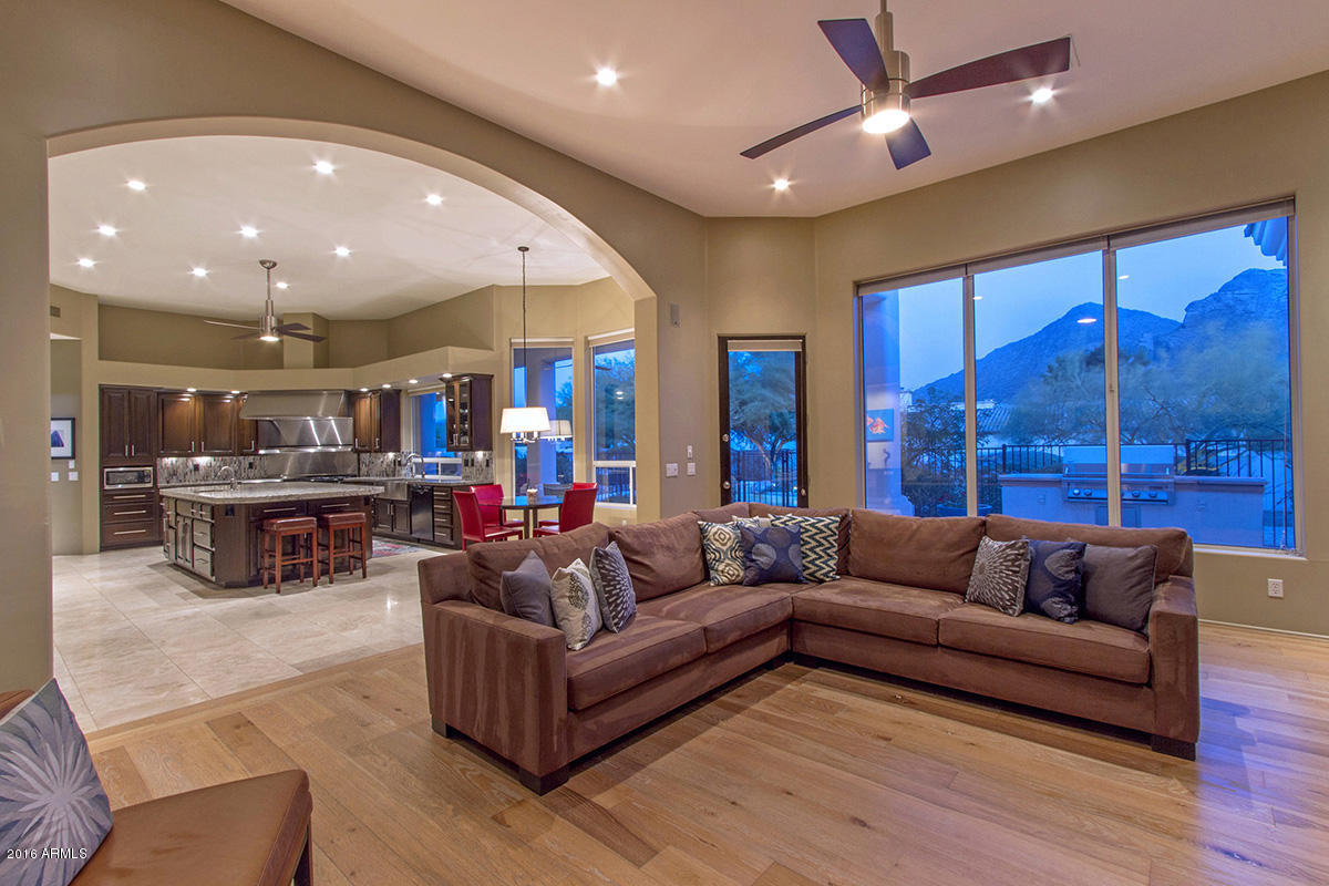 4805 East Pebble Ridge Road Paradise Valley, AZ 85253 - Photo 10 of 37 a living room with furniture and a large window