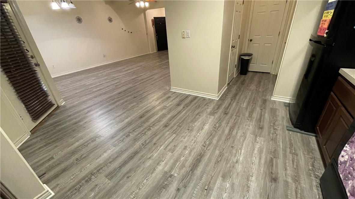 1425 West Villa Maria Road, Unit 602 Bryan, TX 77801 - Photo 13 of 41 wooden floor in an empty room