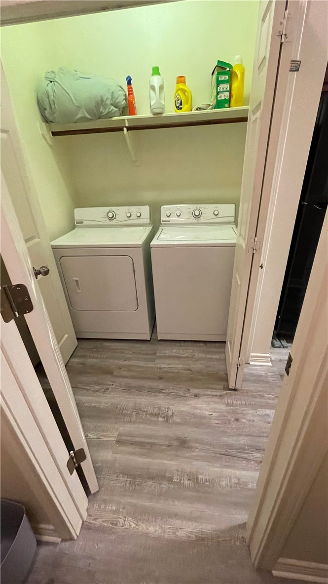 1425 West Villa Maria Road, Unit 602 Bryan, TX 77801 - Photo 17 of 41 a utility room with dryer and washer